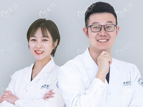 正畸醫(yī)生程錦和助手郭雪梅合照 正畸醫(yī)生程錦和助手郭雪梅合照